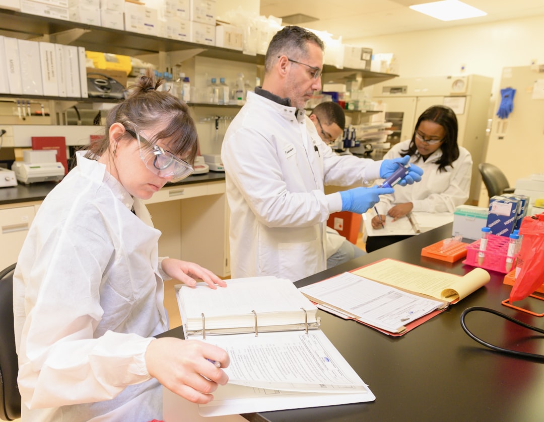 Forensic science training session with professionals learning digital investigation techniques in a classroom