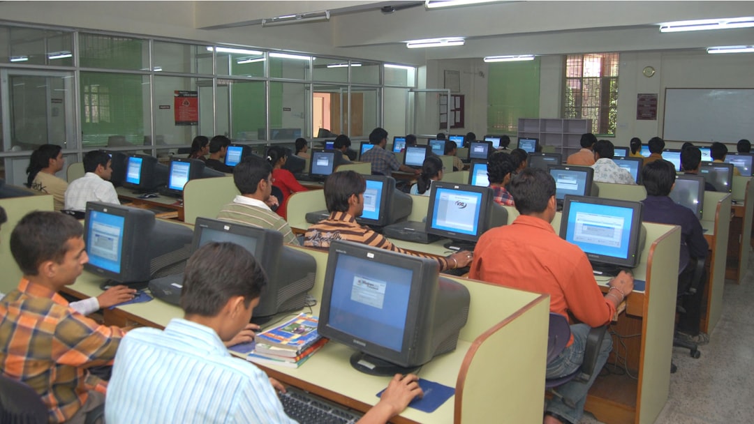 Digital forensics analyst examining computer evidence in a lab